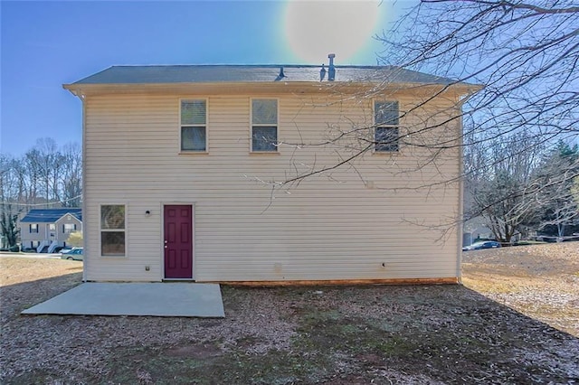 rear view of house with a patio