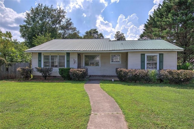 ranch-style house with a front lawn