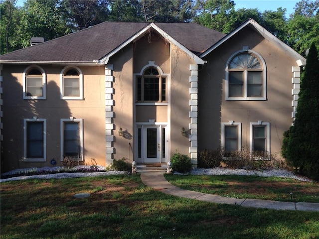 view of front of property with a front yard