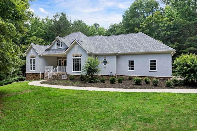 1460 Bakers Bridge Rd, Douglasville, GA 30134 - view of front of home with a front lawn, stucco siding, a shingled roof, and a porch