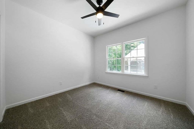 1460 Bakers Bridge Rd, Douglasville, GA 30134 - spare room with baseboards, ceiling fan, and carpet flooring