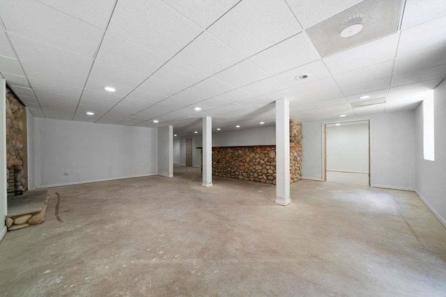 1460 Bakers Bridge Rd, Douglasville, GA 30134 - finished basement featuring a paneled ceiling, baseboards, and recessed lighting