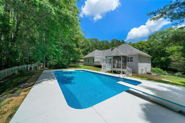 1460 Bakers Bridge Rd, Douglasville, GA 30134 - view of pool featuring a diving board, a patio, and a deck