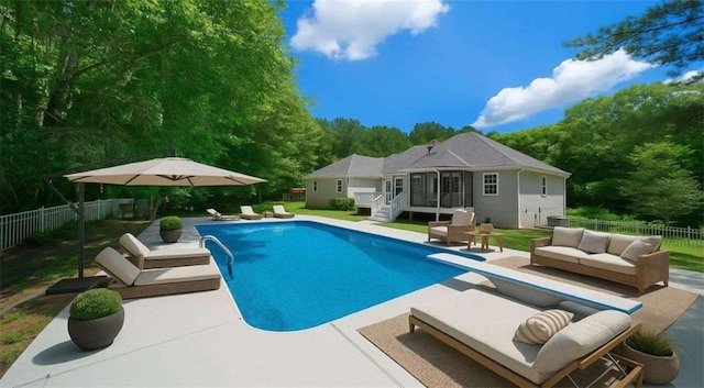 1460 Bakers Bridge Rd, Douglasville, GA 30134 - view of swimming pool featuring outdoor lounge area, a diving board, a patio, a fenced backyard, and view of scattered trees