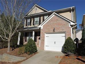 181 Ridgemont Rd, Canton, GA 30114 - traditional-style house featuring concrete driveway, brick siding, and a garage