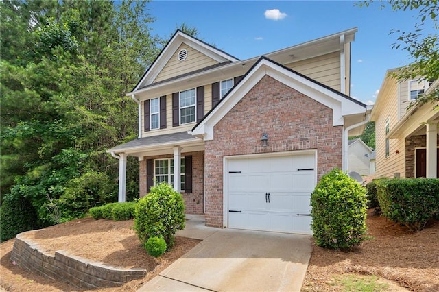 181 Ridgemont Rd, Canton, GA 30114 - traditional-style house featuring brick siding, a garage, and driveway