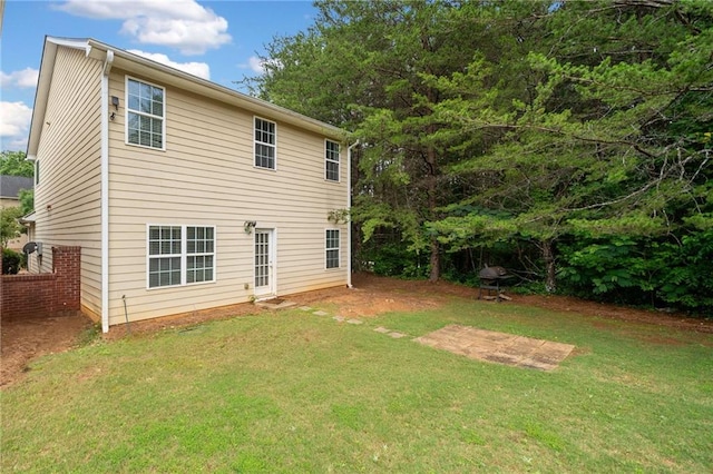 181 Ridgemont Rd, Canton, GA 30114 - back of house featuring a lawn