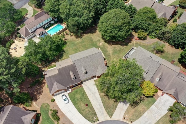 birds eye view of property with a residential view