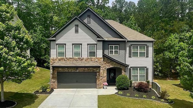 109 Red Fox Dr, Dallas, GA 30157 - view of front of property featuring stone siding, driveway, and a front yard