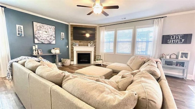 109 Red Fox Dr, Dallas, GA 30157 - living area featuring ceiling fan, wood finished floors, a fireplace, and crown molding