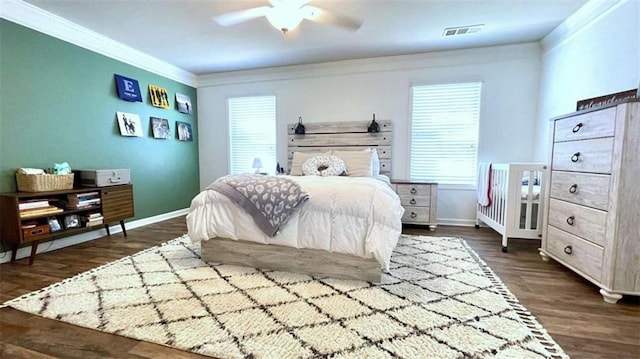 109 Red Fox Dr, Dallas, GA 30157 - bedroom featuring crown molding, dark wood-type flooring, and a ceiling fan