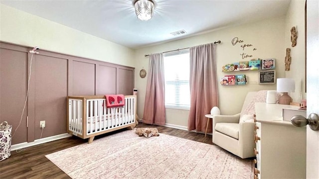 109 Red Fox Dr, Dallas, GA 30157 - bedroom with a crib and wood finished floors
