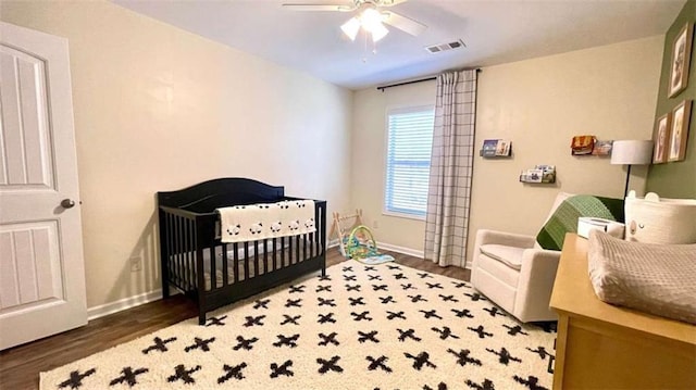 109 Red Fox Dr, Dallas, GA 30157 - bedroom with wood finished floors, a nursery area, and ceiling fan