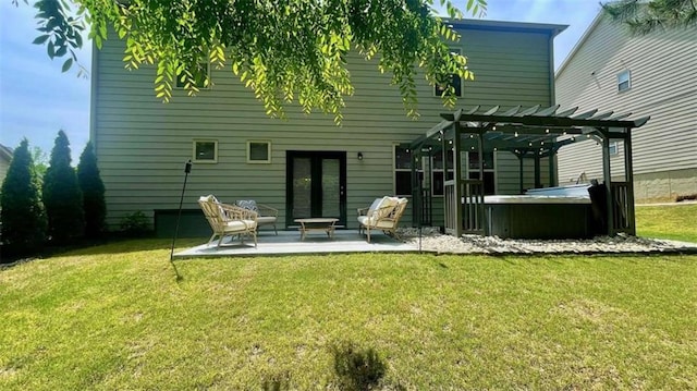 109 Red Fox Dr, Dallas, GA 30157 - rear view of house with a hot tub, a pergola, a patio, and a yard