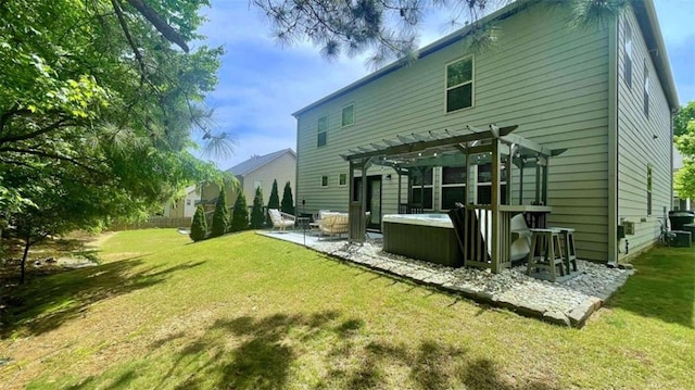 109 Red Fox Dr, Dallas, GA 30157 - back of house featuring a pergola, a patio area, a lawn, and a hot tub