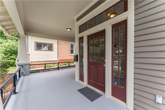 1232 Lucile Ave SW, Atlanta, GA 30310 - property entrance with a porch and an attached carport