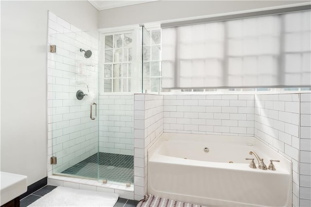 1232 Lucile Ave SW, Atlanta, GA 30310 - full bath featuring a jetted tub, a stall shower, tile patterned floors, and ornamental molding