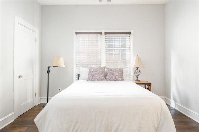 1232 Lucile Ave SW, Atlanta, GA 30310 - bedroom featuring baseboards and wood finished floors