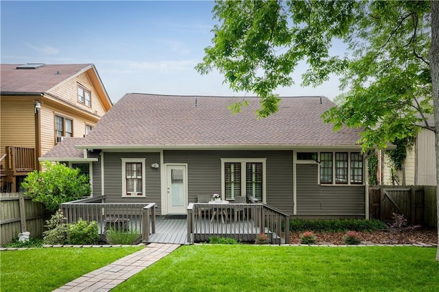 1232 Lucile Ave SW, Atlanta, GA 30310 - back of property featuring a deck, a fenced backyard, and a shingled roof
