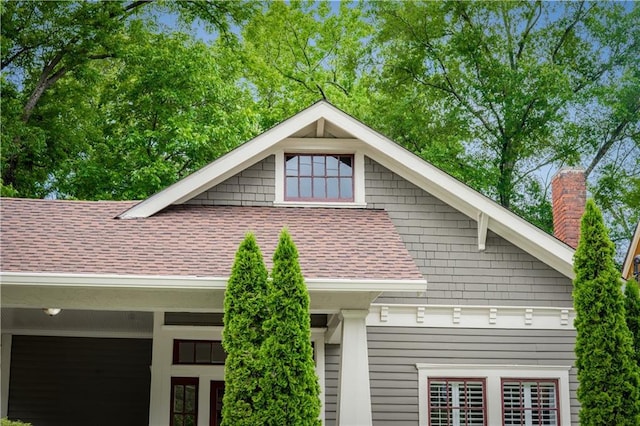1232 Lucile Ave SW, Atlanta, GA 30310 - view of side of home featuring a shingled roof and a chimney