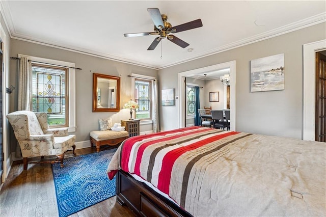 698 Bellemeade Ave NW, Atlanta, GA 30318 - bedroom featuring wood finished floors, ornamental molding, baseboards, and ceiling fan