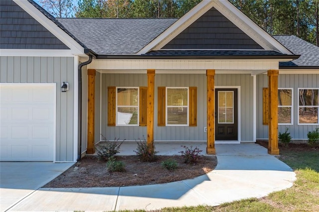 property entrance featuring a porch, board and batten siding, roof with shingles, and an attached garage