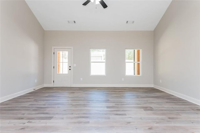 interior space featuring visible vents, wood finished floors, and ceiling fan