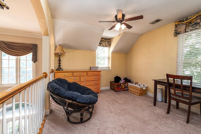 sitting room featuring ceiling fan, lofted ceiling, and light colored carpet