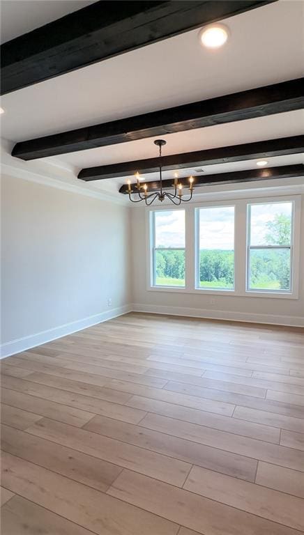 empty room with crown molding, baseboards, beamed ceiling, light wood-style floors, and a notable chandelier