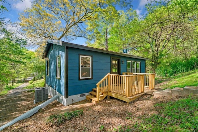 exterior space with cooling unit