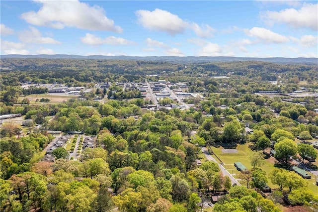 drone / aerial view with a view of trees