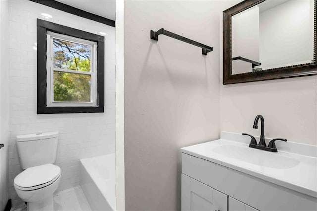 bathroom with toilet, vanity, a bathtub, and walk in shower