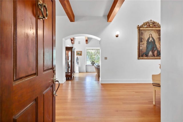 4043 Piedmont Lake Rd, Pine Mountain, GA 31822 - entrance foyer featuring arched walkways, beamed ceiling, light wood-style floors, and baseboards
