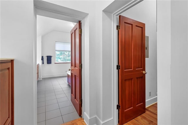 4043 Piedmont Lake Rd, Pine Mountain, GA 31822 - hall featuring vaulted ceiling, baseboards, and light tile patterned flooring