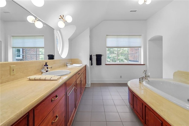 4043 Piedmont Lake Rd, Pine Mountain, GA 31822 - full bath featuring vaulted ceiling, a bath, double vanity, tile patterned floors, and baseboards