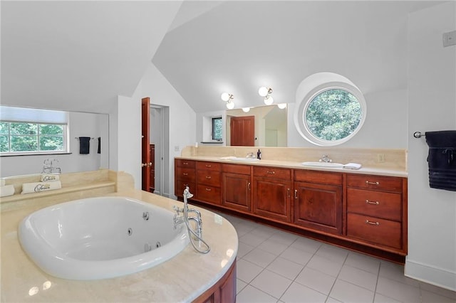 4043 Piedmont Lake Rd, Pine Mountain, GA 31822 - full bathroom featuring double vanity, a whirlpool tub, vaulted ceiling, and tile patterned flooring