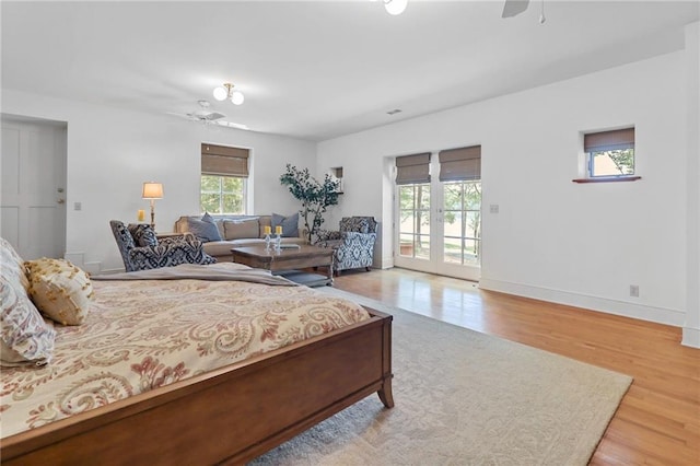 4043 Piedmont Lake Rd, Pine Mountain, GA 31822 - bedroom with access to exterior, wood finished floors, baseboards, and ceiling fan