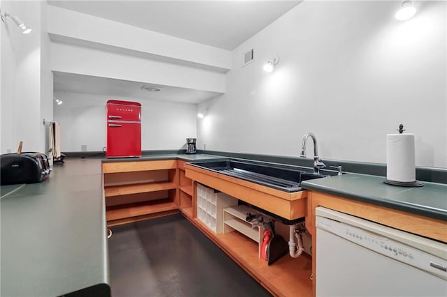 4043 Piedmont Lake Rd, Pine Mountain, GA 31822 - kitchen with white dishwasher and concrete flooring