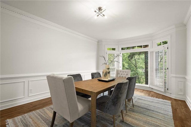 3260 Kingshouse Commons, Johns Creek, GA 30022 - dining space featuring plenty of natural light, crown molding, a decorative wall, wood finished floors, and a wainscoted wall