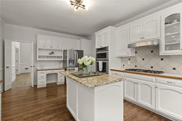 3260 Kingshouse Commons, Johns Creek, GA 30022 - kitchen with stainless steel appliances, white cabinetry, open shelves, a kitchen island, and ornamental molding