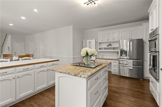 3260 Kingshouse Commons, Johns Creek, GA 30022 - kitchen with stainless steel appliances, a kitchen island, white cabinets, recessed lighting, and dark wood-type flooring
