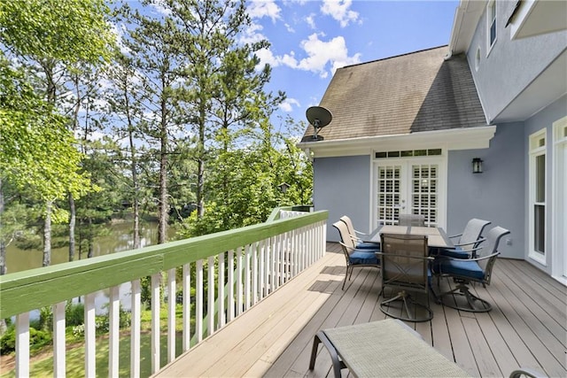 3260 Kingshouse Commons, Johns Creek, GA 30022 - wooden terrace with a water view and outdoor dining area