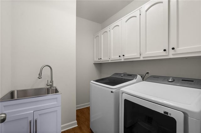 3260 Kingshouse Commons, Johns Creek, GA 30022 - laundry room featuring washing machine and clothes dryer, cabinet space, and dark wood-style floors