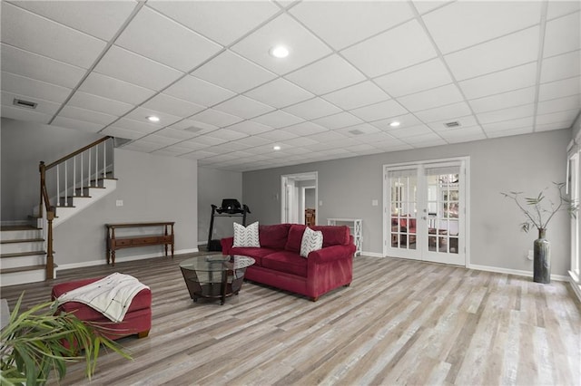 3260 Kingshouse Commons, Johns Creek, GA 30022 - living room featuring wood finished floors, stairs, french doors, recessed lighting, and a drop ceiling