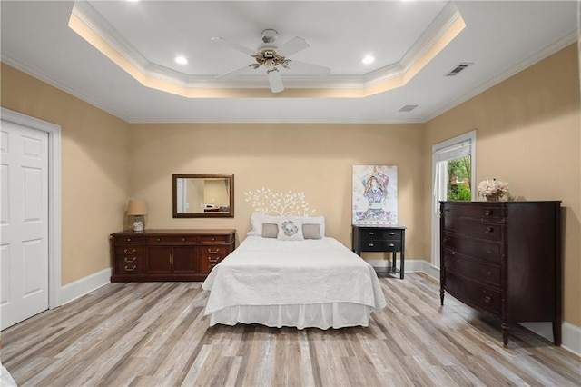 3260 Kingshouse Commons, Johns Creek, GA 30022 - bedroom with a tray ceiling, light wood-style floors, ornamental molding, and a ceiling fan
