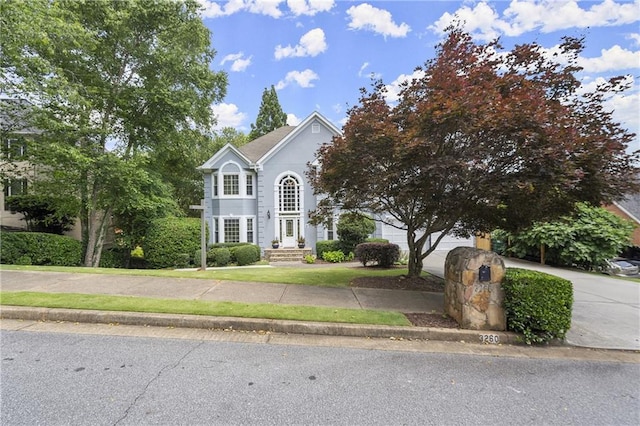 3260 Kingshouse Commons, Johns Creek, GA 30022 - view of front of home with concrete driveway and a garage