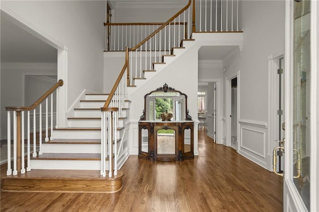 3260 Kingshouse Commons, Johns Creek, GA 30022 - entryway with stairway, wood finished floors, a towering ceiling, and ornamental molding