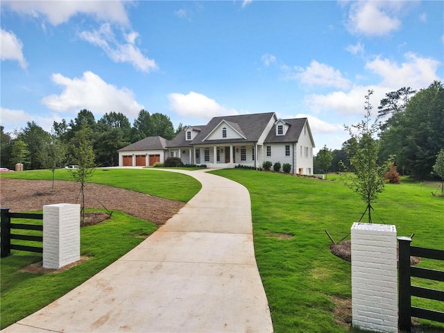 view of front of home featuring a garage and a front lawn