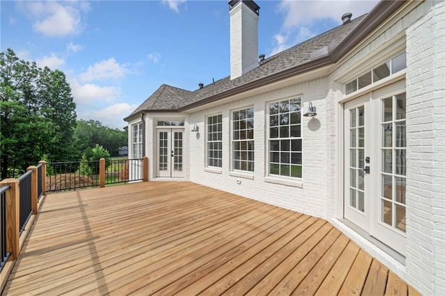 wooden terrace featuring french doors