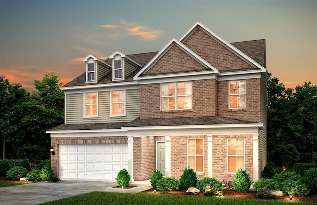 view of front of property featuring a garage